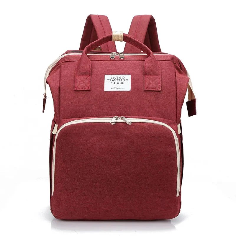 Large capacity MANDOTOS mommy bag with multiple compartments and sturdy handles, ideal for carrying baby essentials.