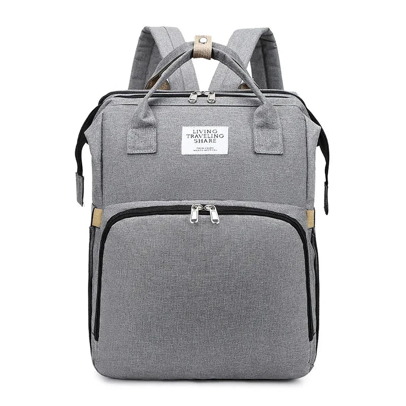 Large capacity MANDOTOS mommy bag with multiple compartments and adjustable straps, designed for convenient parent travel and organization.