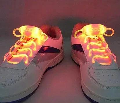 Mandotos LED light-up shoelaces glowing in the dark, colorful glow-in-the-dark shoe laces for sneakers.