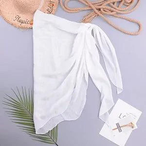 Mandotos LuxeWave chiffon beach wrap draped over a model, showcasing its lightweight, chic, and versatile cover-up design.