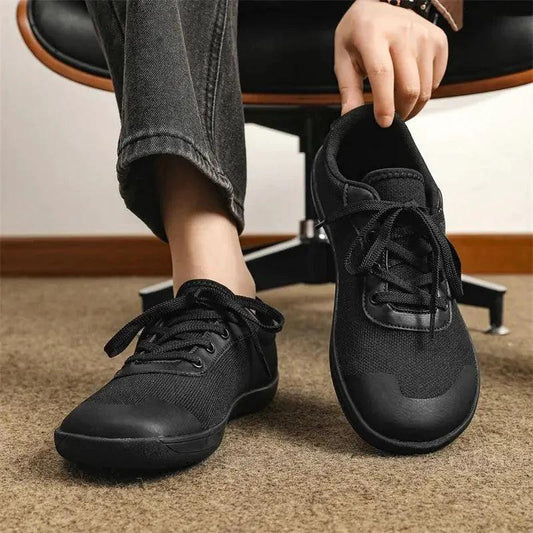 Mandotos men's breathable wide toe mesh running shoes with lightweight responsive sole and supportive design.