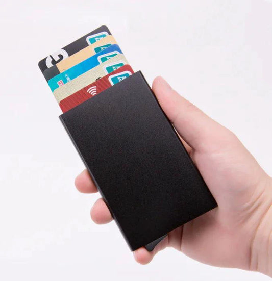 Men's RFID slim carbon fiber money clip and card holder by MANDOTOS, showcasing sleek design and secure card storage.