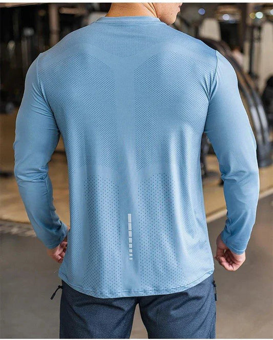 Mandotos men's long sleeve sports fitness shirt for badminton, running, and training, made of quick-dry, lightweight, breathable material.