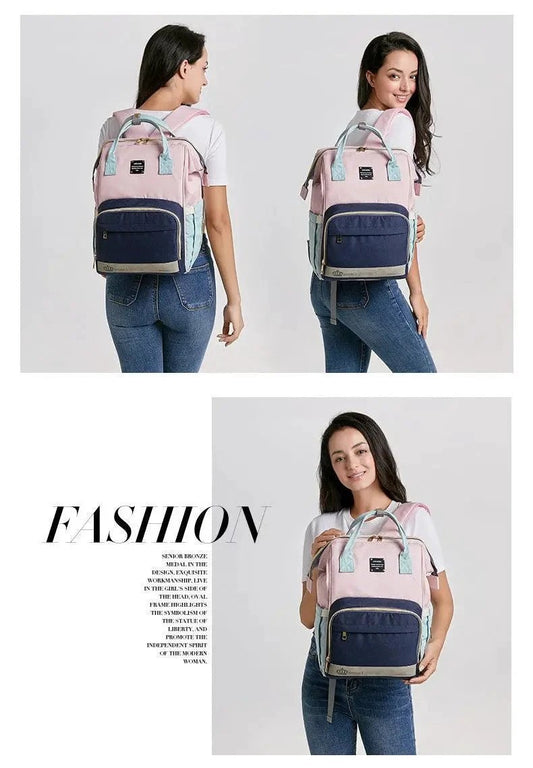 Mandotos Mummy Maternity Bag with multiple compartments and handles, designed for moms to carry baby essentials comfortably.