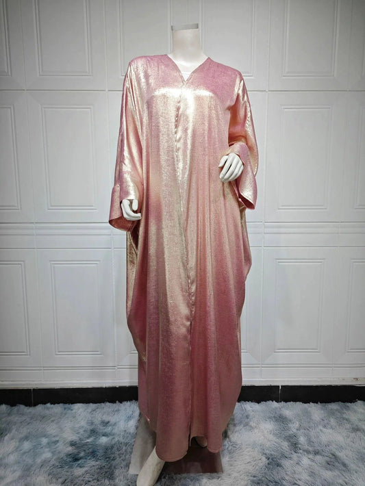 Mandotos Muslim robe abaya in black with intricate embroidery, flowing fabric, traditional modest dress for women.