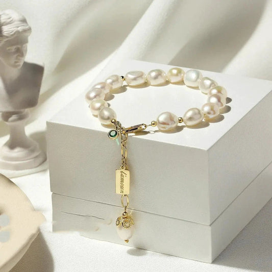 Mandotos luxury jewelry featuring a natural zircon and pearl bracelet with elegant design and fine craftsmanship.