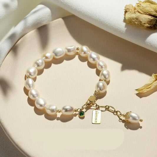 Luxury jewelry bracelet featuring natural zircon and pearl by MANDOTOS, showcasing elegant design and sparkling gemstones.