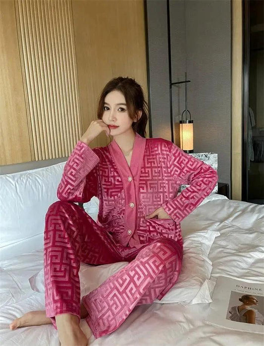Gold velvet women's pajama suit by MANDOTOS, featuring a comfortable, luxurious long-sleeve top and matching pants.