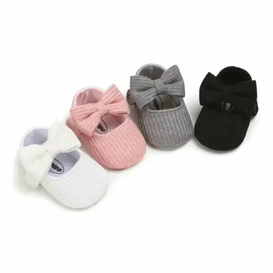 Mandotos newborn soft shoes in pastel colors, featuring a cozy, flexible design for infant comfort and gentle fit.