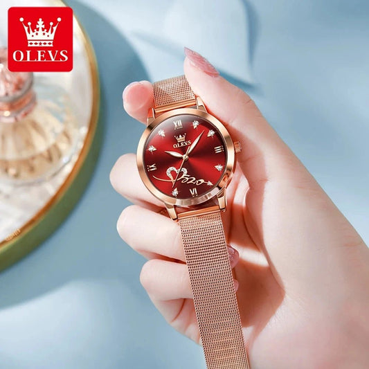 Mandotos OLEVS luxury women's rose gold quartz watch with stainless steel mesh strap and love dial design.