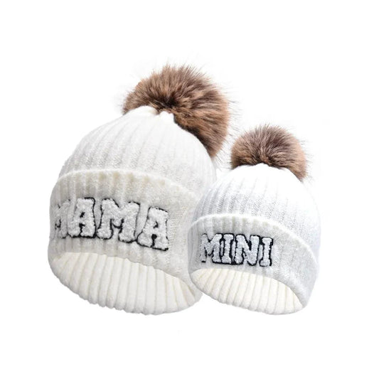 Matching parent-child beanie hats set by MANDOTOS, includes three cozy winter knit hats for mama, papa, and baby.