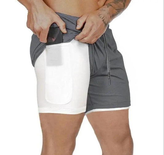 Mandotos Pocket Compression Shorts in black, featuring built-in pockets and stretchy fabric for athletic support and comfort.