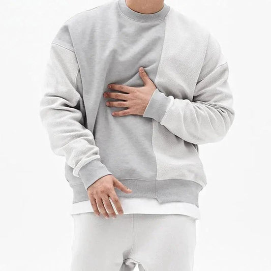 Loose men's round neck pullover sweater by MANDOTOS, showcasing a comfortable fit and casual style in soft fabric.