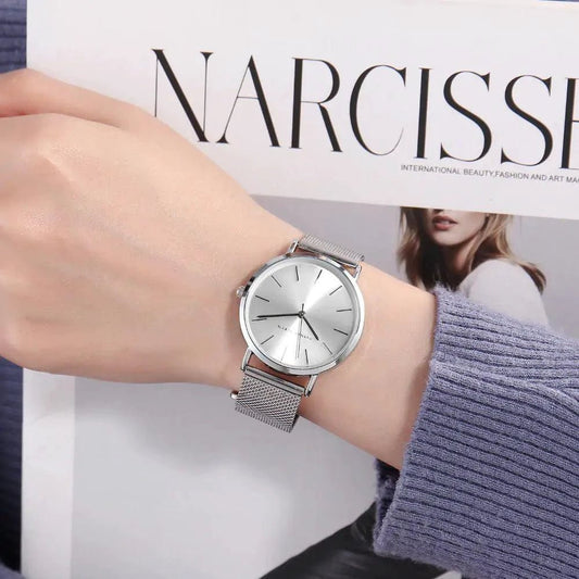 Rose gold stainless steel ladies' watch by MANDOTOS featuring a sleek round face and elegant design.