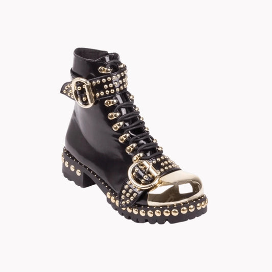 Mandotos Rugged Studded Buckle Boots featuring leather design with metal buckle accents and sturdy soles.