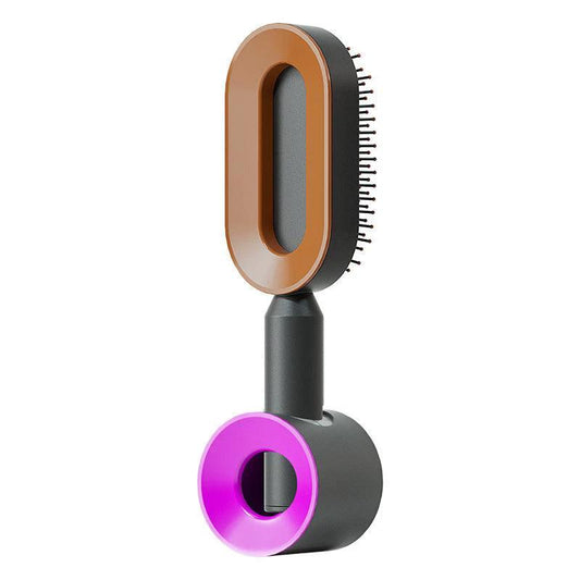 Mandotos self-cleaning hair brush with scalp massage features, showing the brush's bristles and ergonomic handle for easy cleaning.