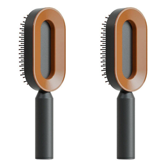 Mandotos self-cleaning hair brush with scalp massage features, shown with ergonomic handle and bristles for gentle scalp care.