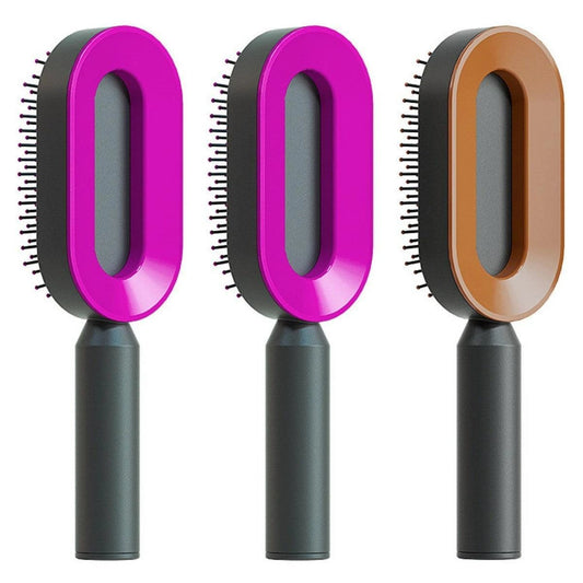 Mandotos self-cleaning hair brush with scalp massage feature and one-click cleaning mechanism, showing the brush's bristles and ergonomic design.