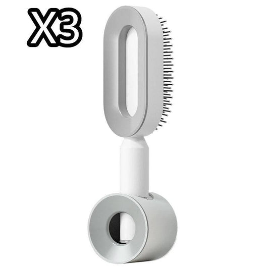 Mandotos self-cleaning hair brush with scalp massage features, showing the brush's ergonomic design and cleaning mechanism.