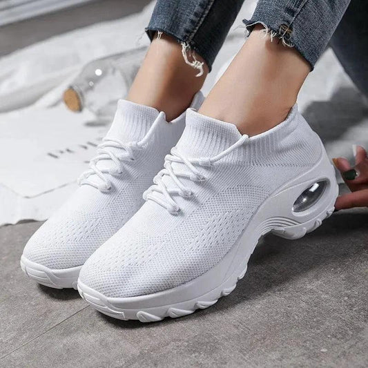 Mandotos women's sports shoes with flying knit sock design, lightweight and flexible for active wear.