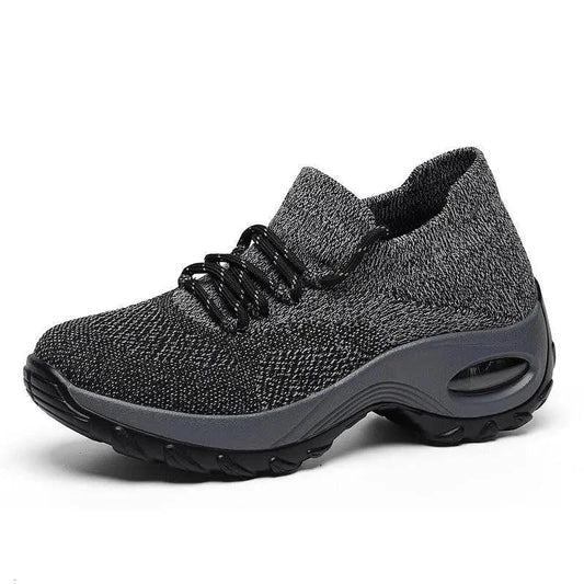 Mandotos women's sports shoes with flying knit design and shaking sole, lightweight athletic shoes for active wear.
