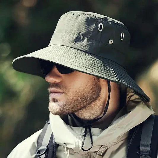Mandotos sun-safe stylish bucket hat in neutral color with wide brim, perfect for outdoor sun protection and casual wear.