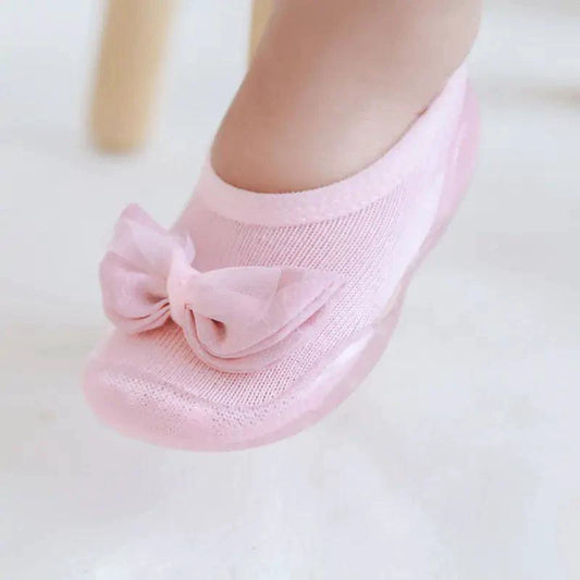 Mandotos toddler shoes in soft fabric with Velcro straps, designed for comfort and easy wear for young children.
