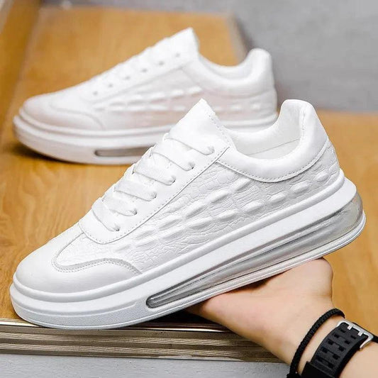 Trendy leather men's casual sneakers by MANDOTOS, featuring stylish design and comfortable fit for everyday wear.