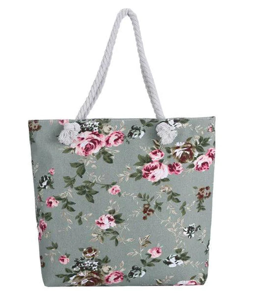 Twin-sided artistic canvas bag by MANDOTOS with colorful abstract designs on each side, sturdy handles, and versatile style.