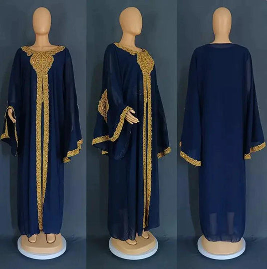 Mandotos two-piece gold kaftan abaya dress with flowing fabric and elegant design, perfect for special occasions.