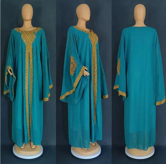 Mandotos two-piece gold kaftan abaya dress set featuring elegant flowing fabric and intricate design details.