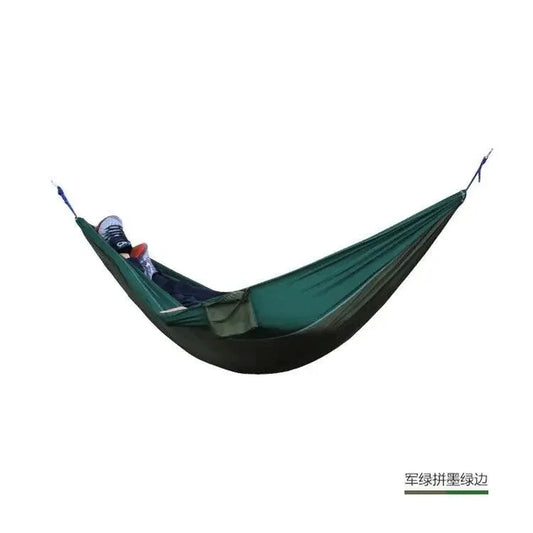 Mandotos Ultimate Oasis single and double hammock made of durable fabric, shown hanging between trees in a lush outdoor setting.