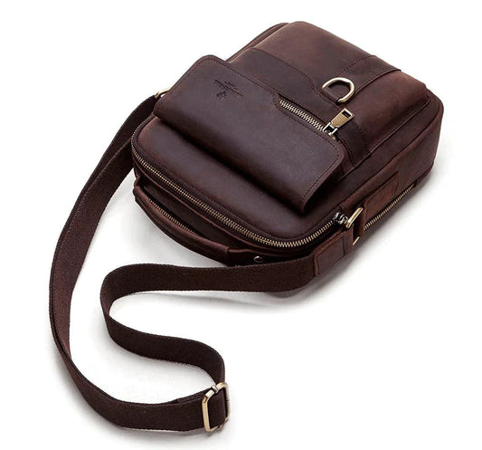 Mandotos vintage leather messenger bag with adjustable strap, front pocket, and classic brown finish.