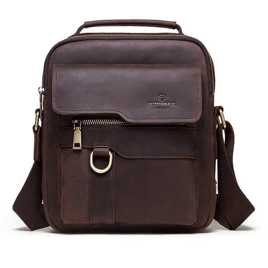 Vintage leather messenger bag by MANDOTOS with adjustable strap, front flap, and classic design for everyday use.