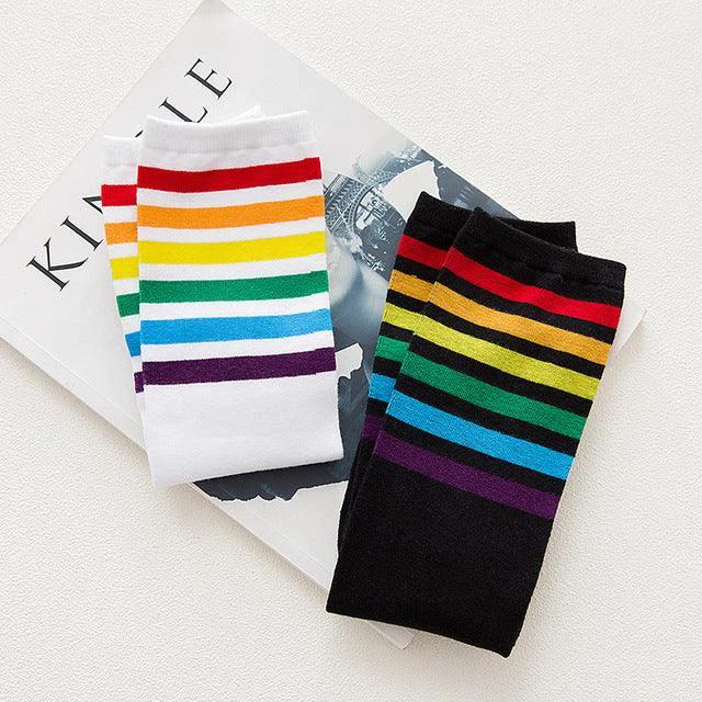 Mandotos women's striped knee-high cotton socks with colorful horizontal patterns, soft and comfortable for everyday wear.