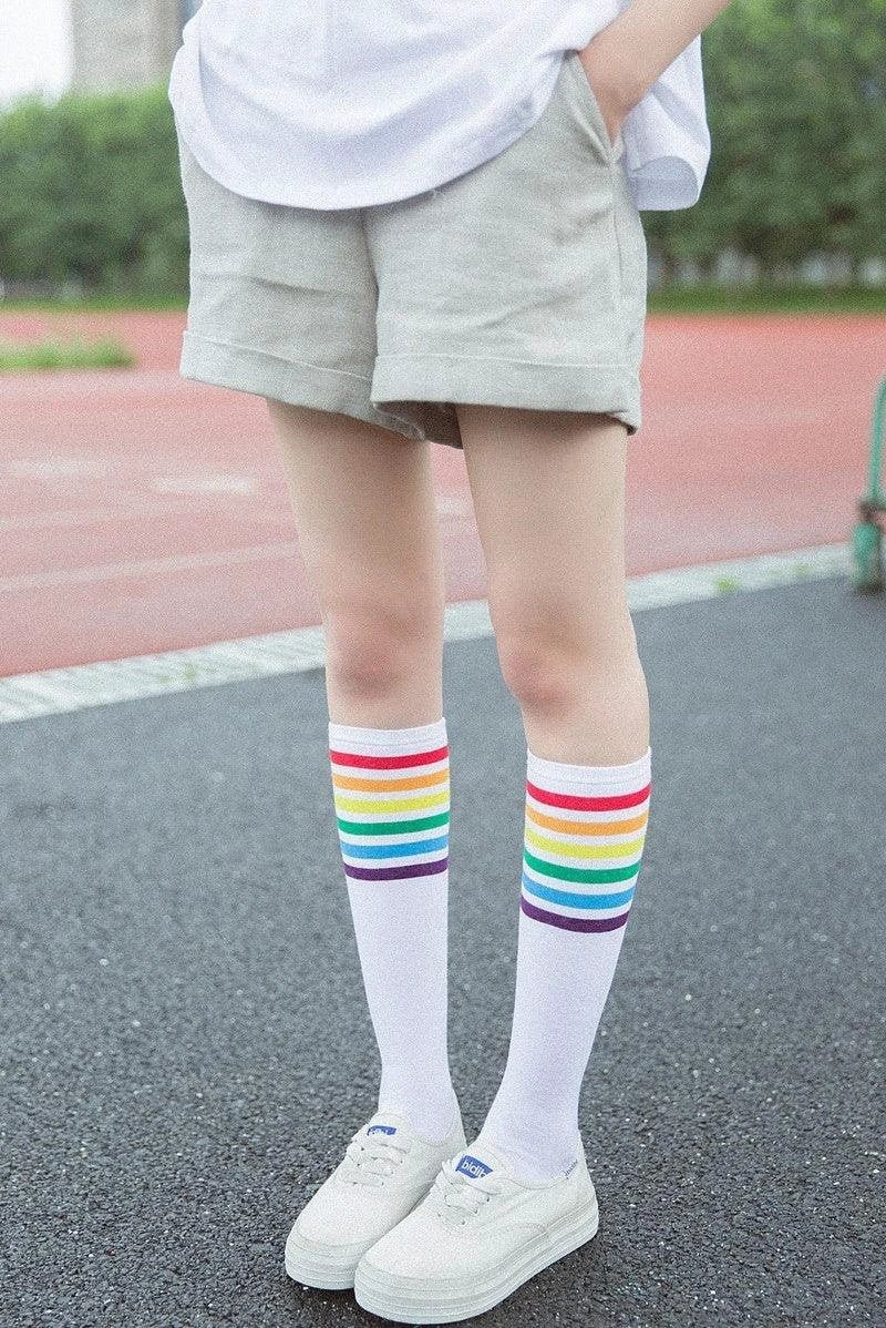 Mandotos women's striped knee-high cotton socks featuring colorful horizontal stripes, soft and comfortable for daily wear.