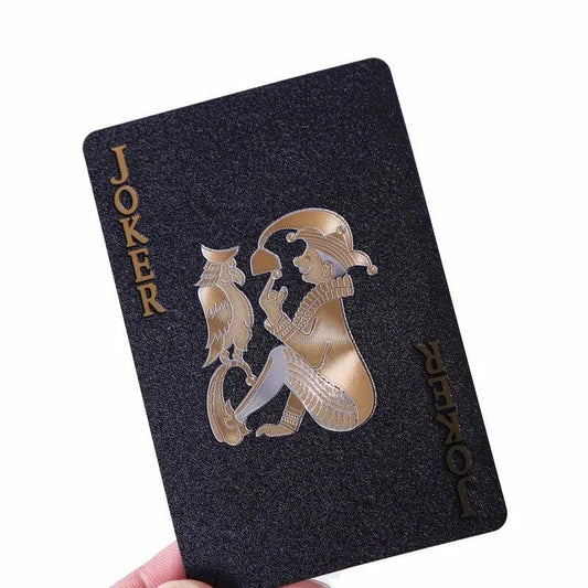 Black and gold playing cards by Dmagic, waterproof poker suit, ideal for card games and magic tricks, perfect for collections.