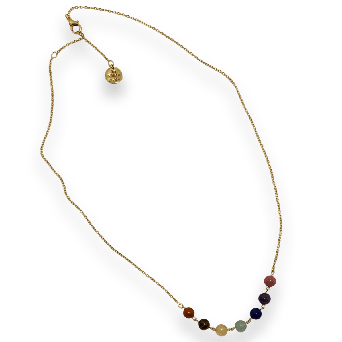 Chakra balance necklace by The Urban Charm featuring natural gemstones and a charm, designed to promote energy harmony.