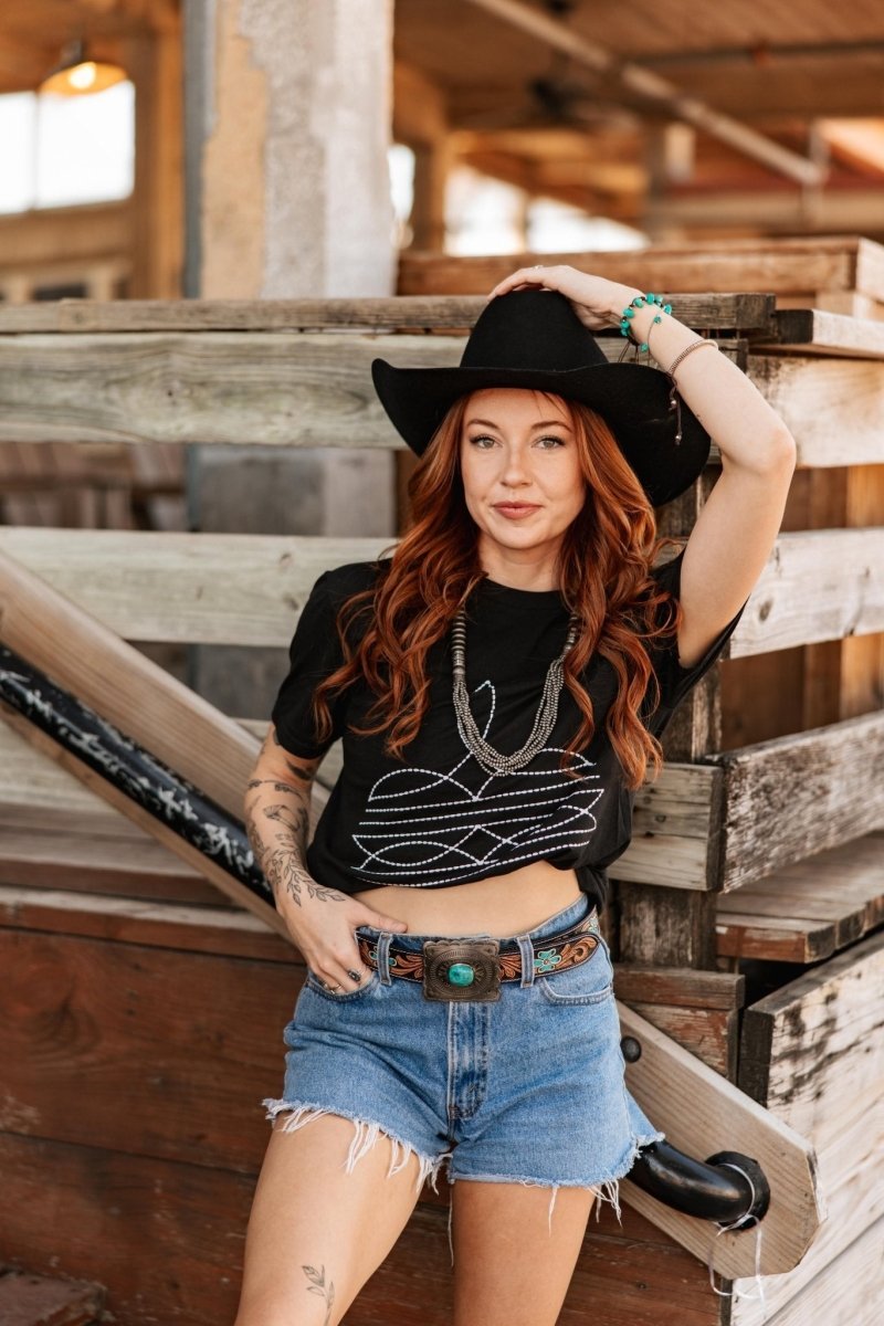 Black Wild Junkie graphic tee featuring Western-inspired boot stitch design, casual and stylish for everyday wear.
