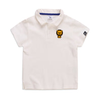Cream kids polo shirt with lion graphic, blue collar trim, size 90 — perfect for casual wear or school