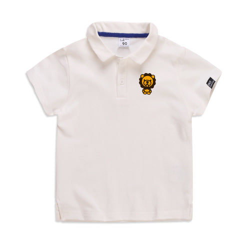 Cream kids polo shirt with lion graphic, blue collar trim, size 90 — perfect for casual wear or school