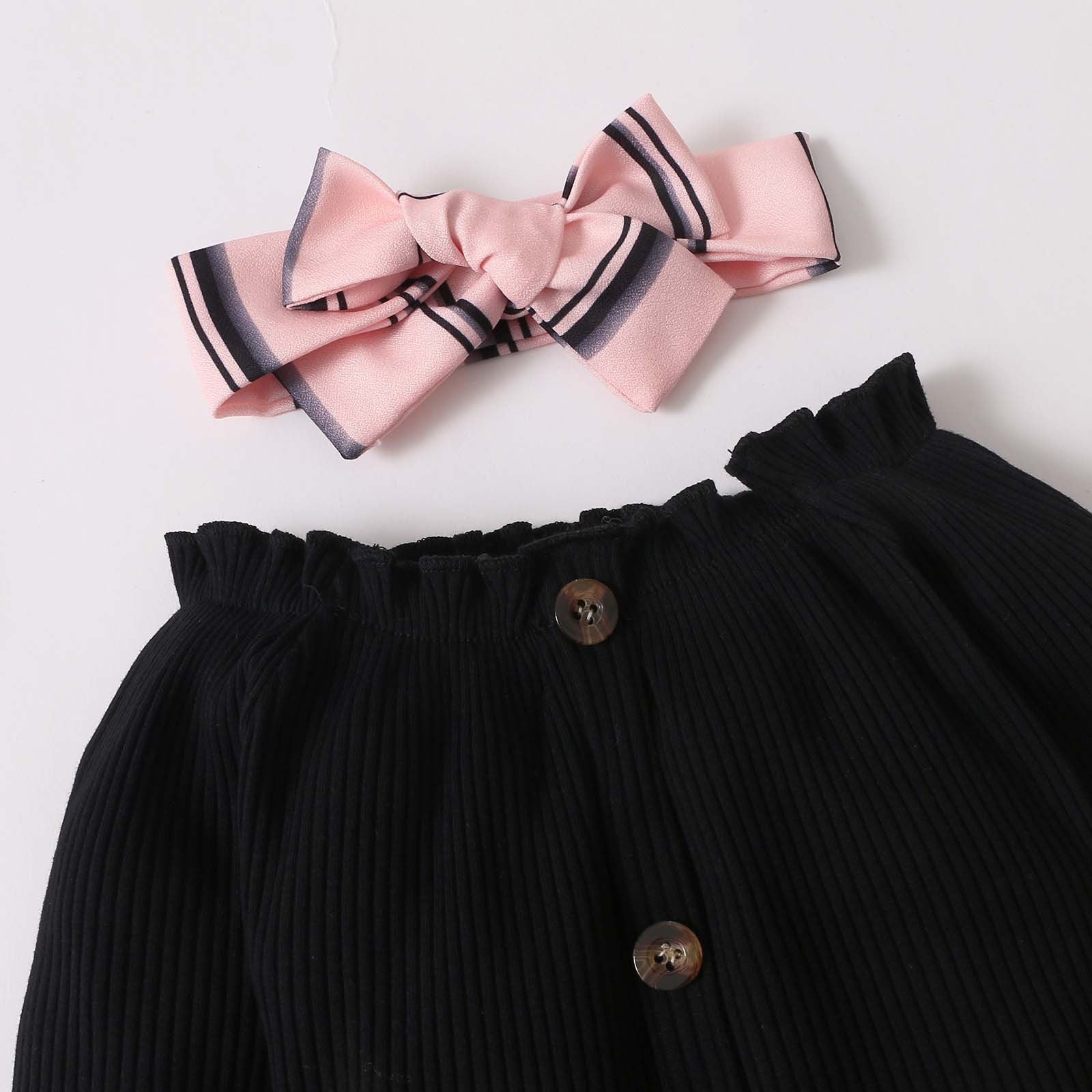 Pink striped bow headband with black ribbed pants featuring buttons, stylish kids fashion set