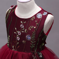 Burgundy girls' dress with floral embroidery and tulle skirt, perfect for parties and special occasions