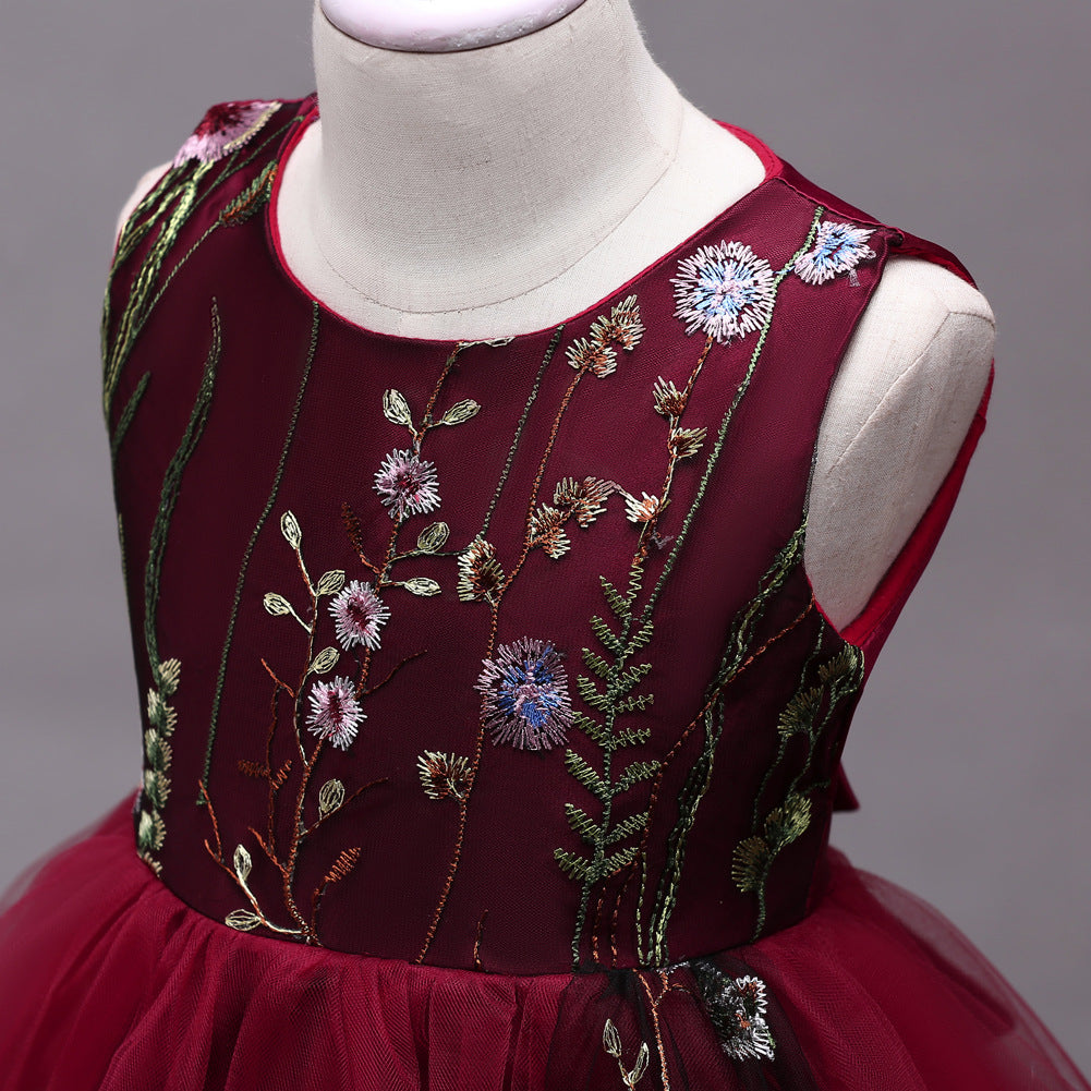 Burgundy girls' dress with floral embroidery and tulle skirt, perfect for parties and special occasions