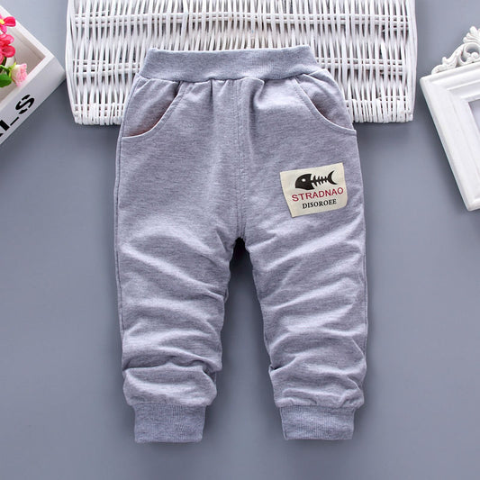 Gray kids joggers with fishbone patch, cozy elastic cuffs, perfect for casual wear