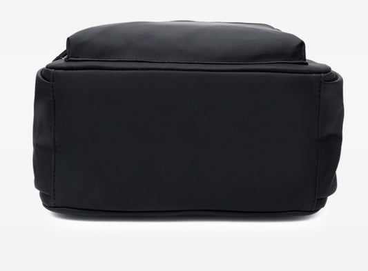 Black structured tote bag with clean lines and durable stitching, ideal for everyday fashion use