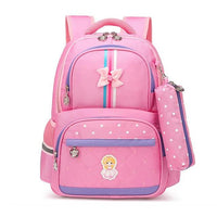 Pink kids school backpack with bow, polka dots, and princess patch, ideal for girls' daily use