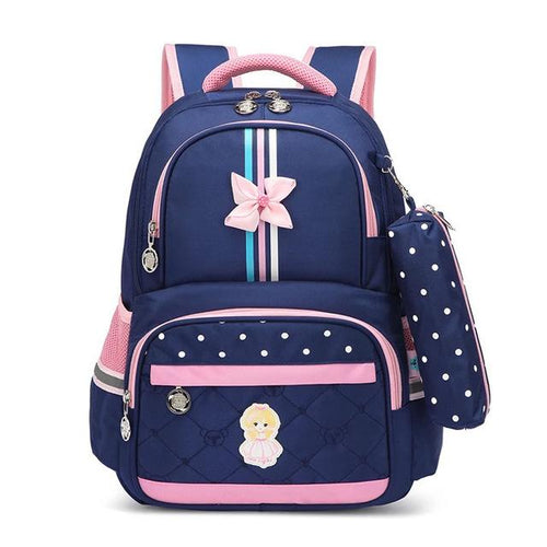 Navy blue kids school backpack with pink bow, polka dots, and princess patch, ideal for girls' daily use
