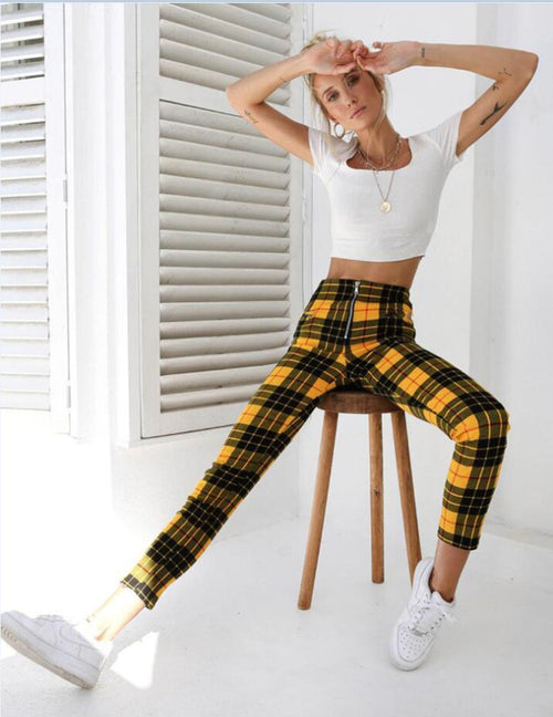 Yellow plaid pants with white crop top and sneakers, stylish casual fashion