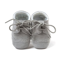 Gray suede baby shoes with laces, soft soles for infants, stylish first walkers
